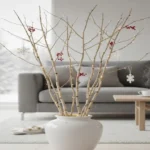 Scandinavian pyntekvister winter arrangement with fairy lights and ornaments in a minimalist living room
