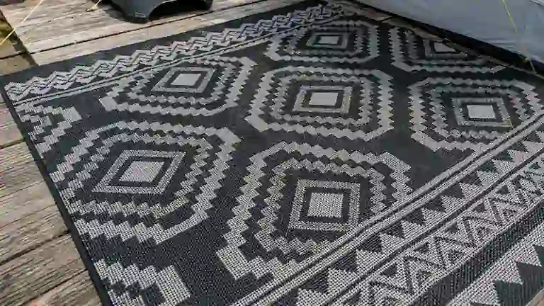 Quest Elite awning carpet with a black and grey geometric pattern.