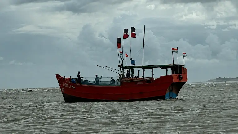 Local fishing boat near Junput harbor and Baguran Jalpai.
