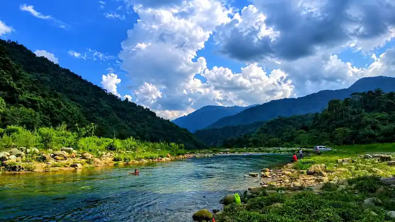A traveler swimming in the river at Bunkulung village near Mirik.