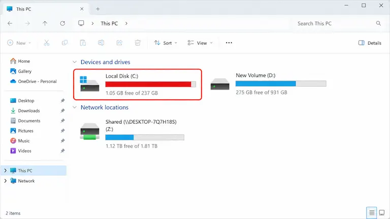 Windows File Explorer showing full C drive with red bar.